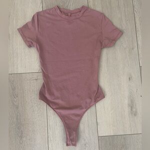 Skims tee bodysuit size small light mauve/neutral pink color